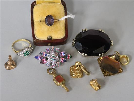 A 9ct gold and amethyst ring, a fob seal watch key, two watch fob seals and sundries,